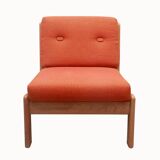 1970s chair in oak and orange cushions