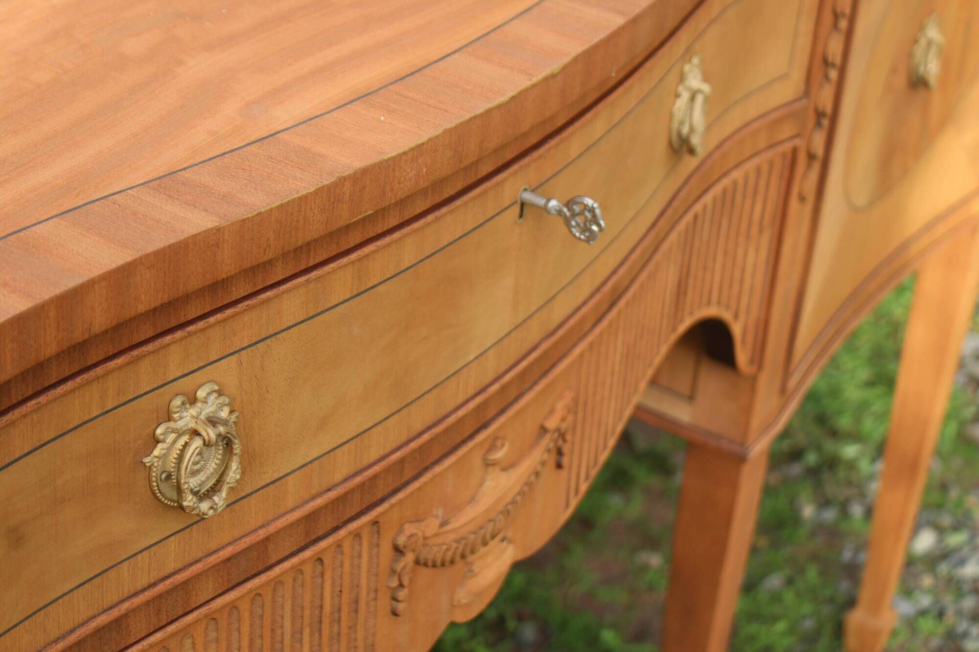 English-made enfilade in Louis XVI style with light wood veneers.