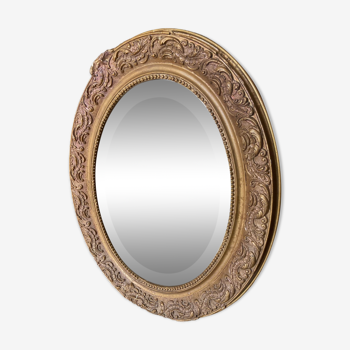 Old beveled oval mirror