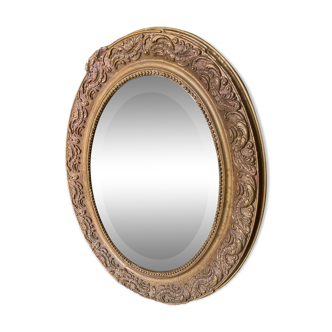 Old beveled oval mirror