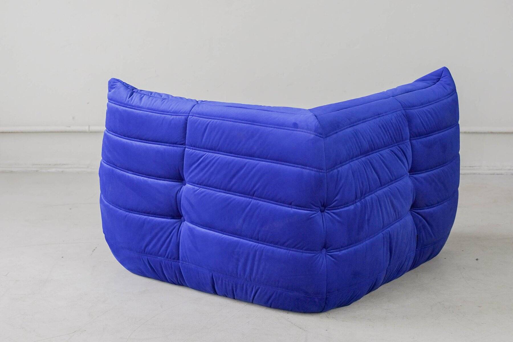 Togo corner chair in blue velvet by Michel Ducaroy for Ligne Roset