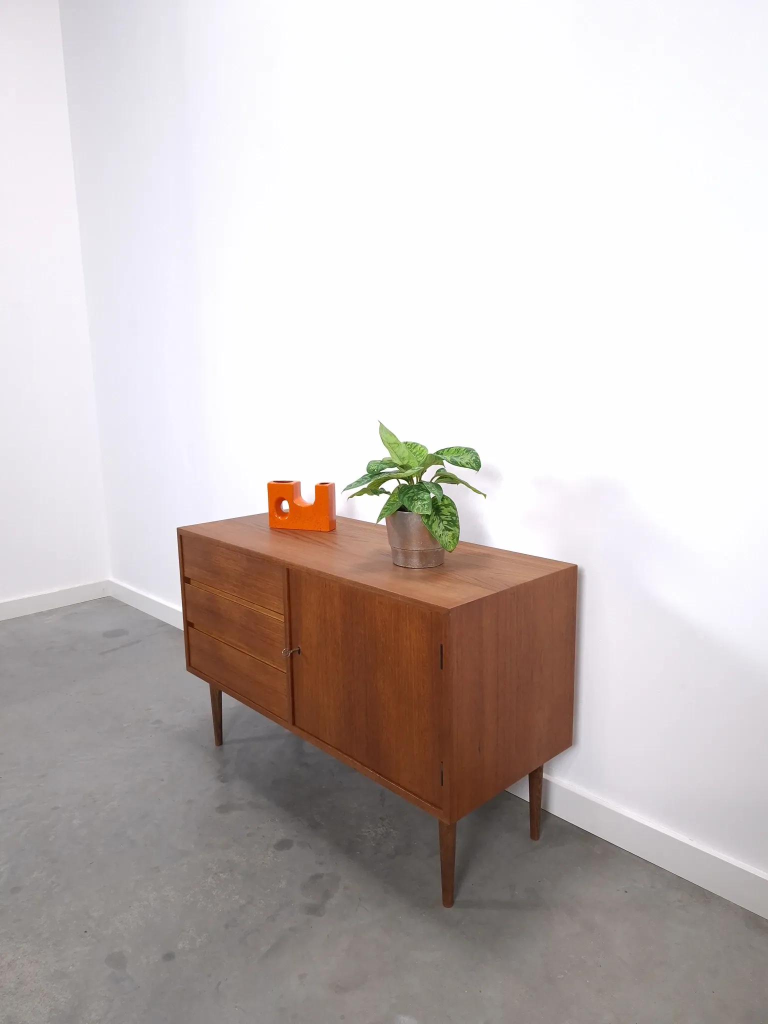 Vintage teak cabinet from the 1960s, sideboard with 3 drawers and a door.