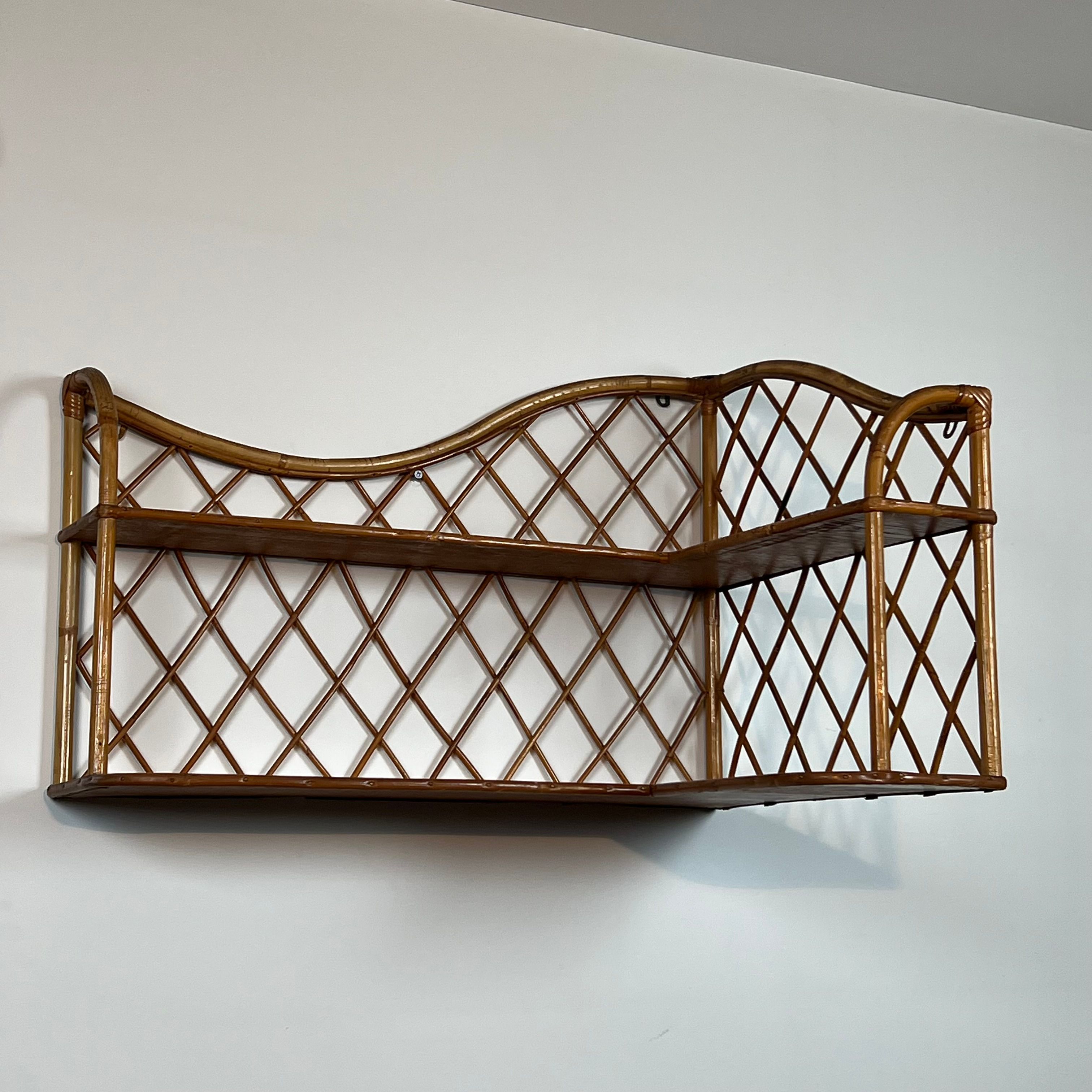 Corner wall shelf in rattan attributed to Audoux-Minet.