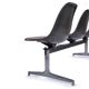 Tandem bench with brown Naugahyde pad shell chairs by Charles and Ray Eames for Herman Miller