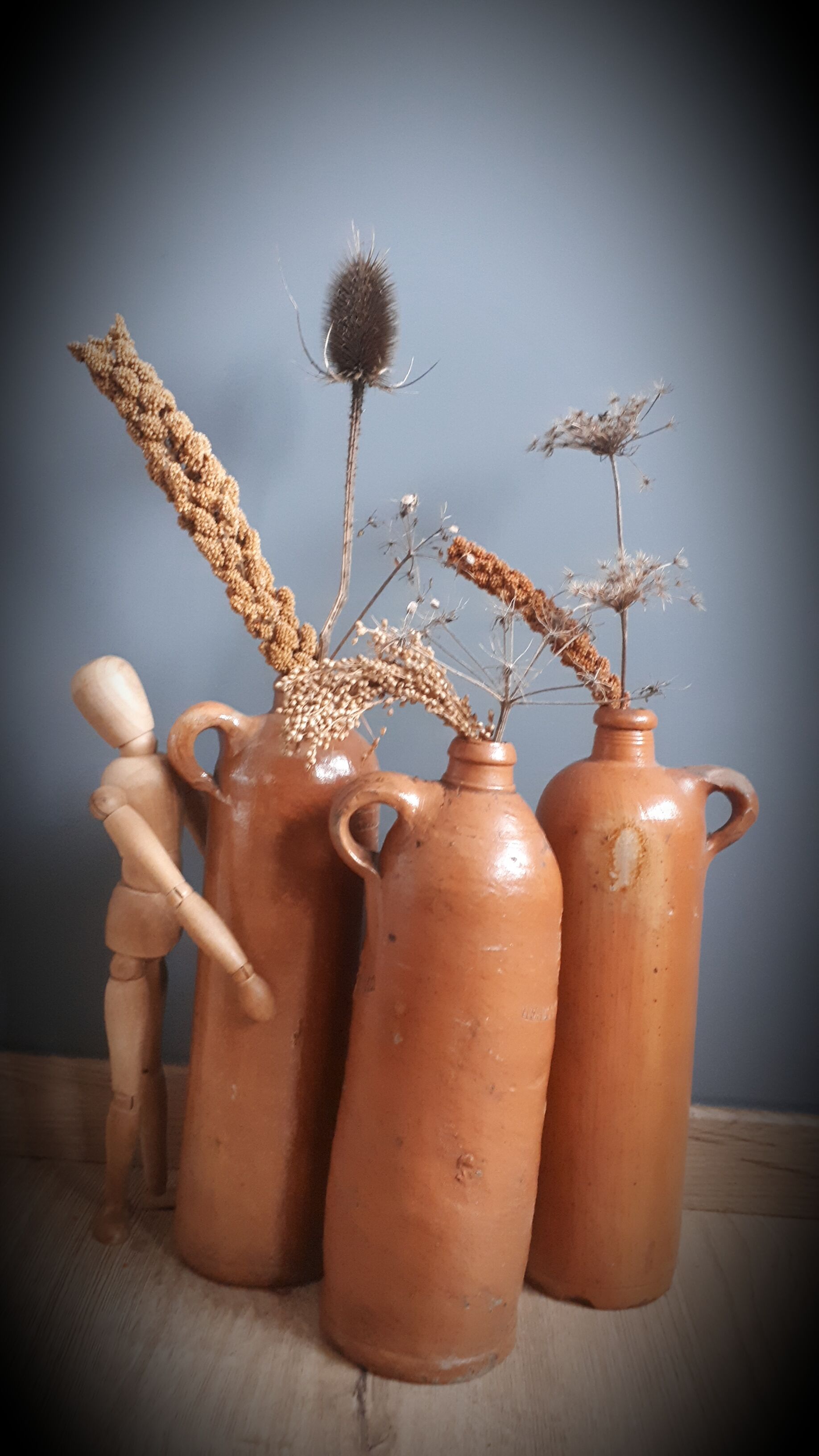 Trio of sandstone bottles