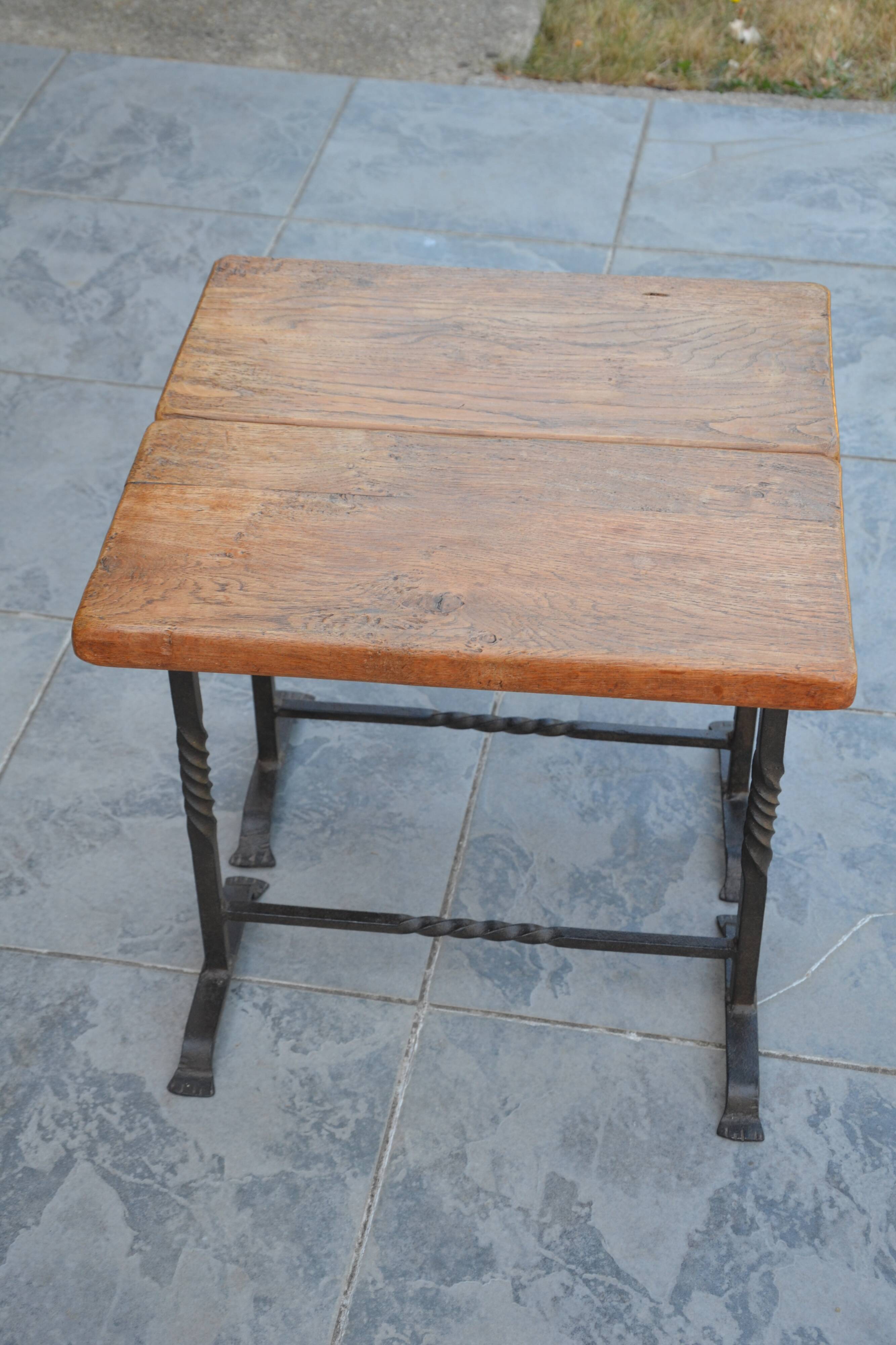 Unusual modular coffee table in oak and wrought iron.
