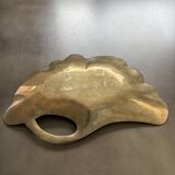 Old brass pocket emptier