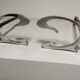 Pair of andirons in brushed steel and metal edition Jean-Paul Créations circa 1970