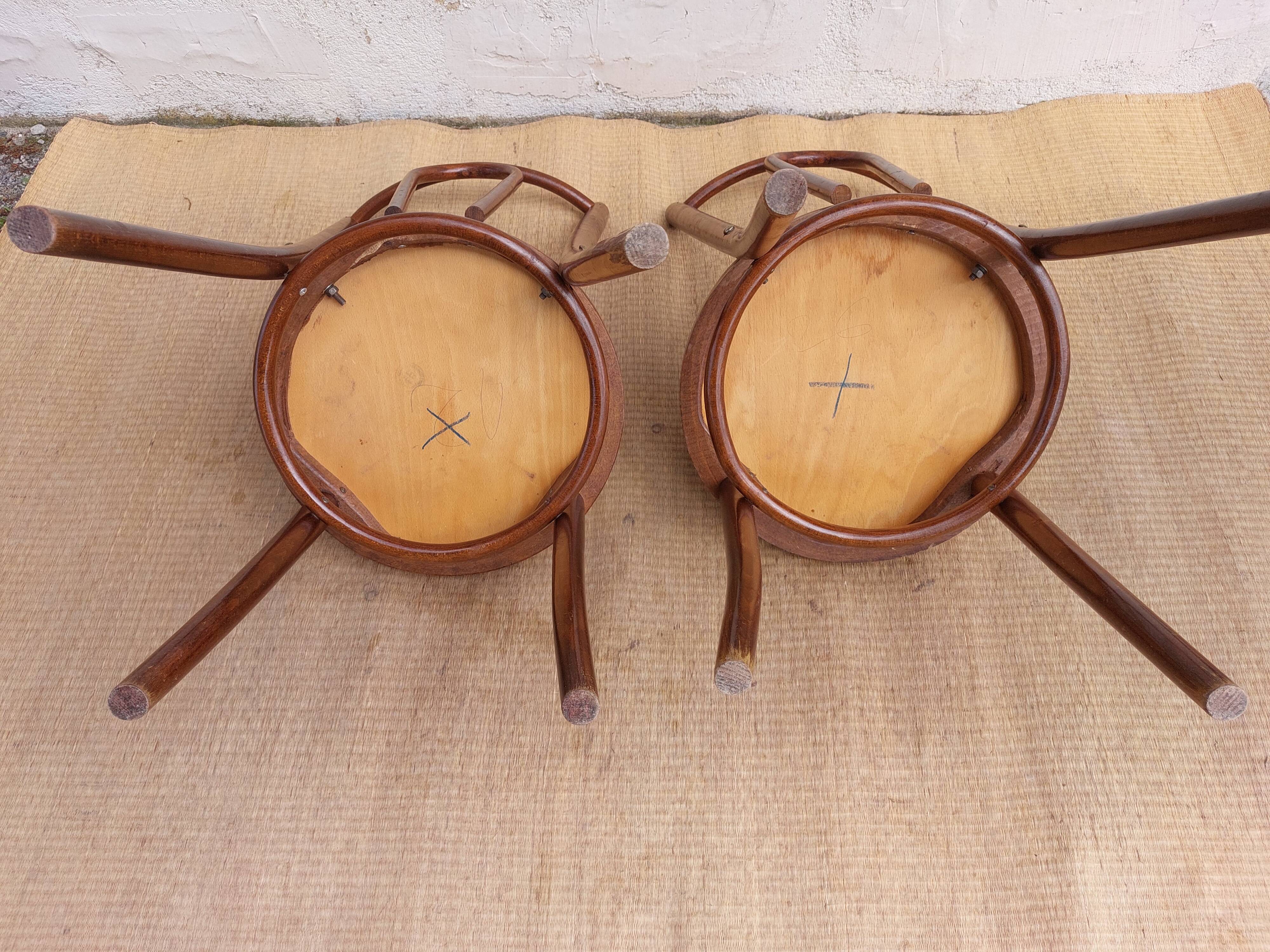 pair of bistro chairs, curved wood and pattern on the seat