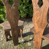 2 solid wood Johnny Ludecher folk art chairs