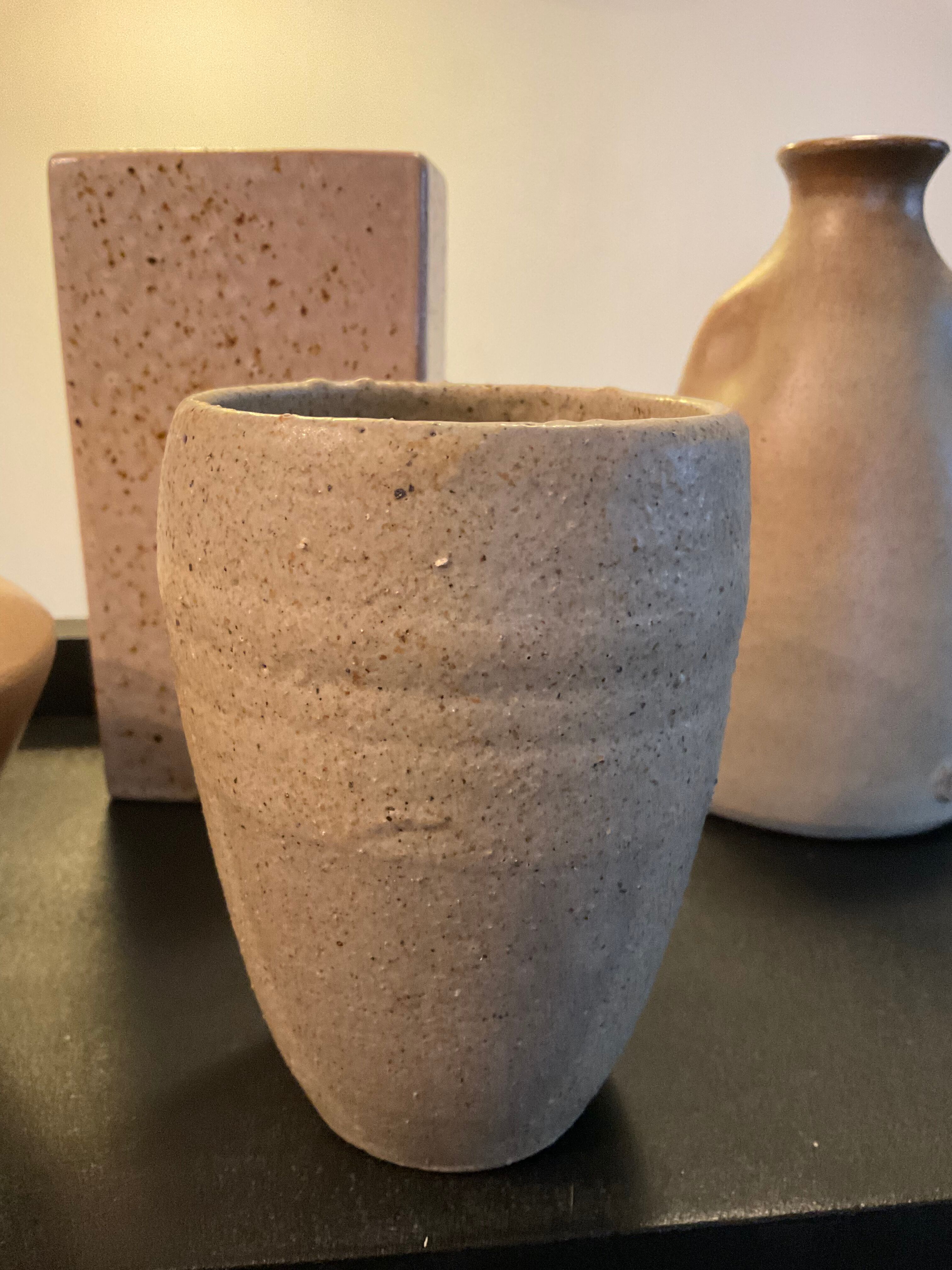 Series of 5 vintage beige ceramic vases