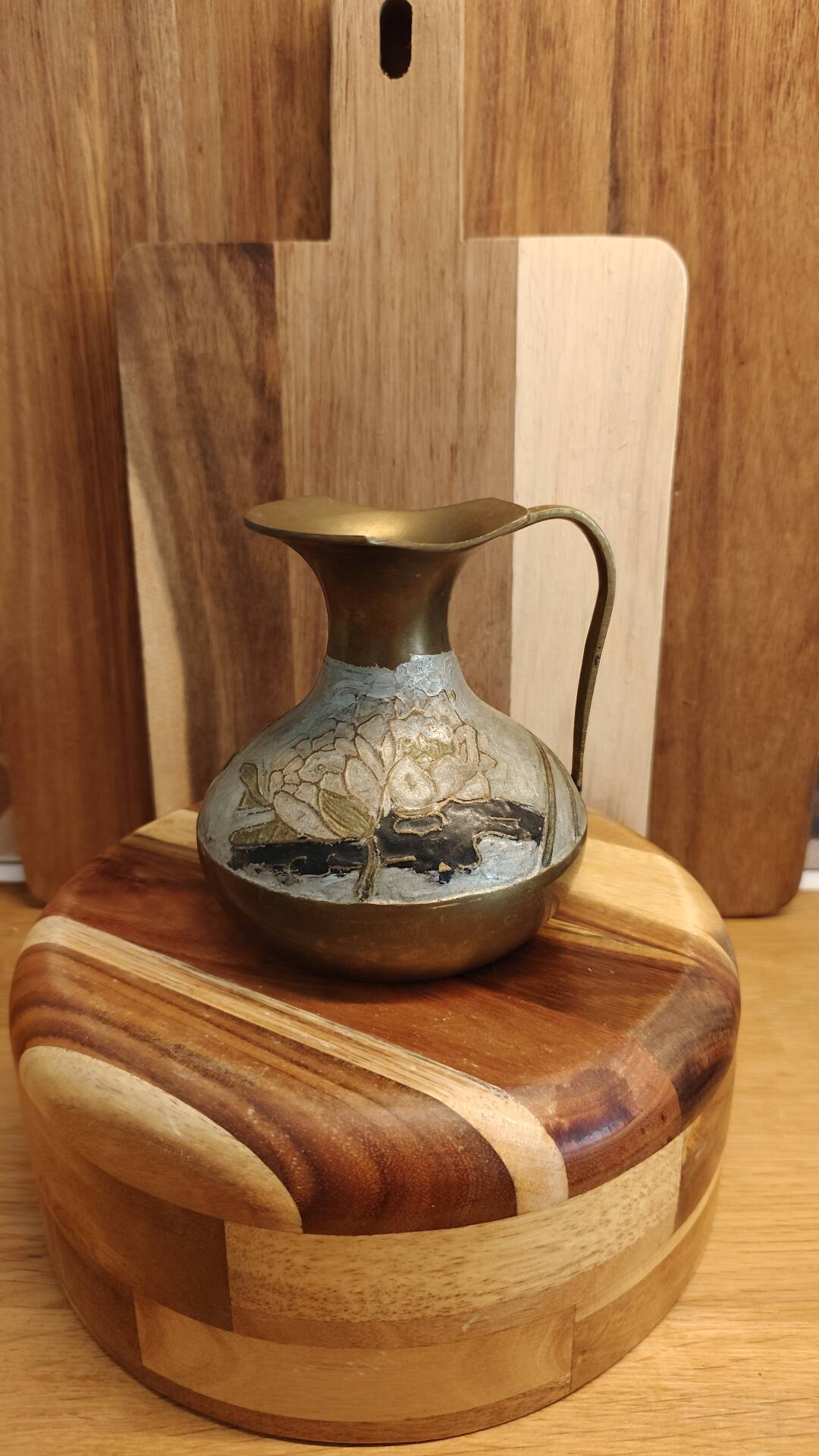 I am selling this very pretty jug/decorative vase in an artisanal style.