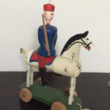 Soldier on wooden horse to shoot