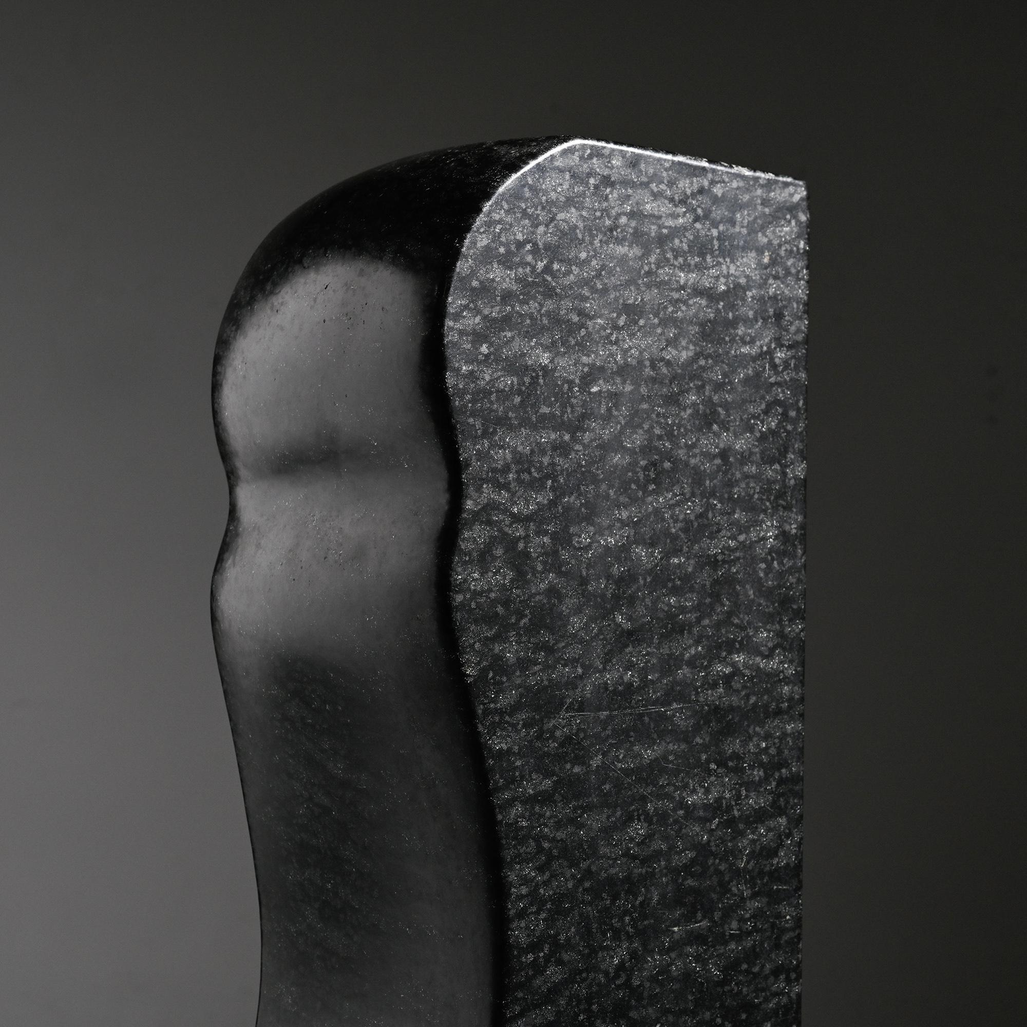 Abstract sculpture in diabase by Robert Neuhauser, Switzerland, circa 1985.