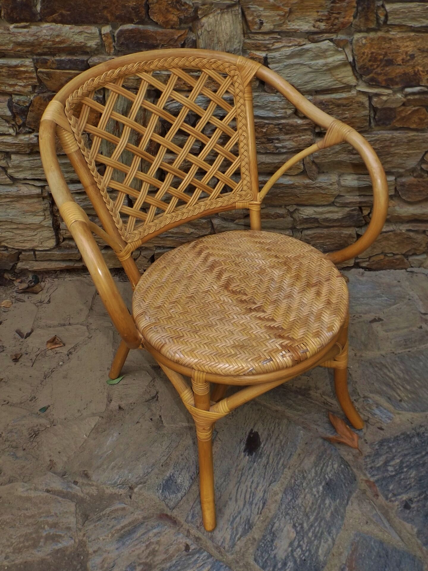 Armchair in rattan in Assisi year circa 1970