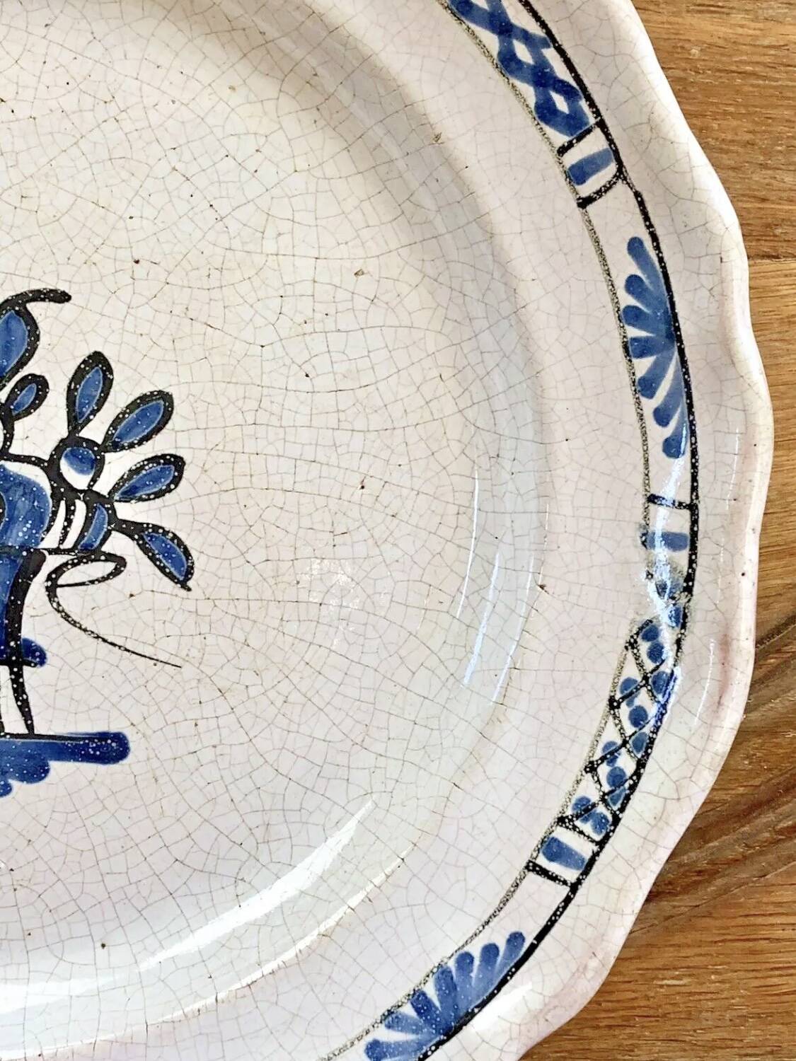 Old round hollow dish XVIII black bottom Rouen Forges les eaux