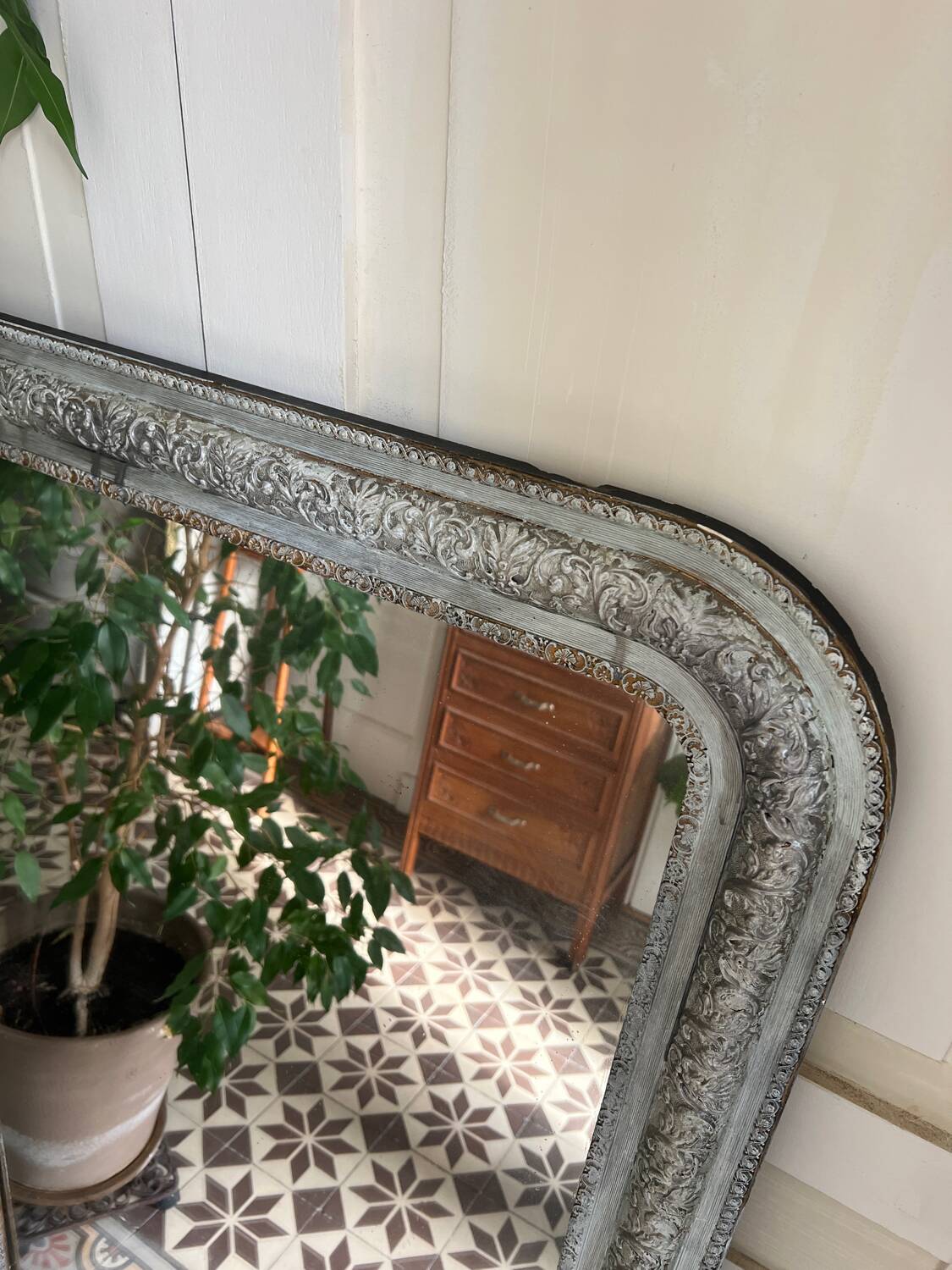 Antique mirror in stucco and wood