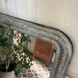 Antique mirror in stucco and wood