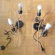 Pair of stylized 2-branch brass wall lights