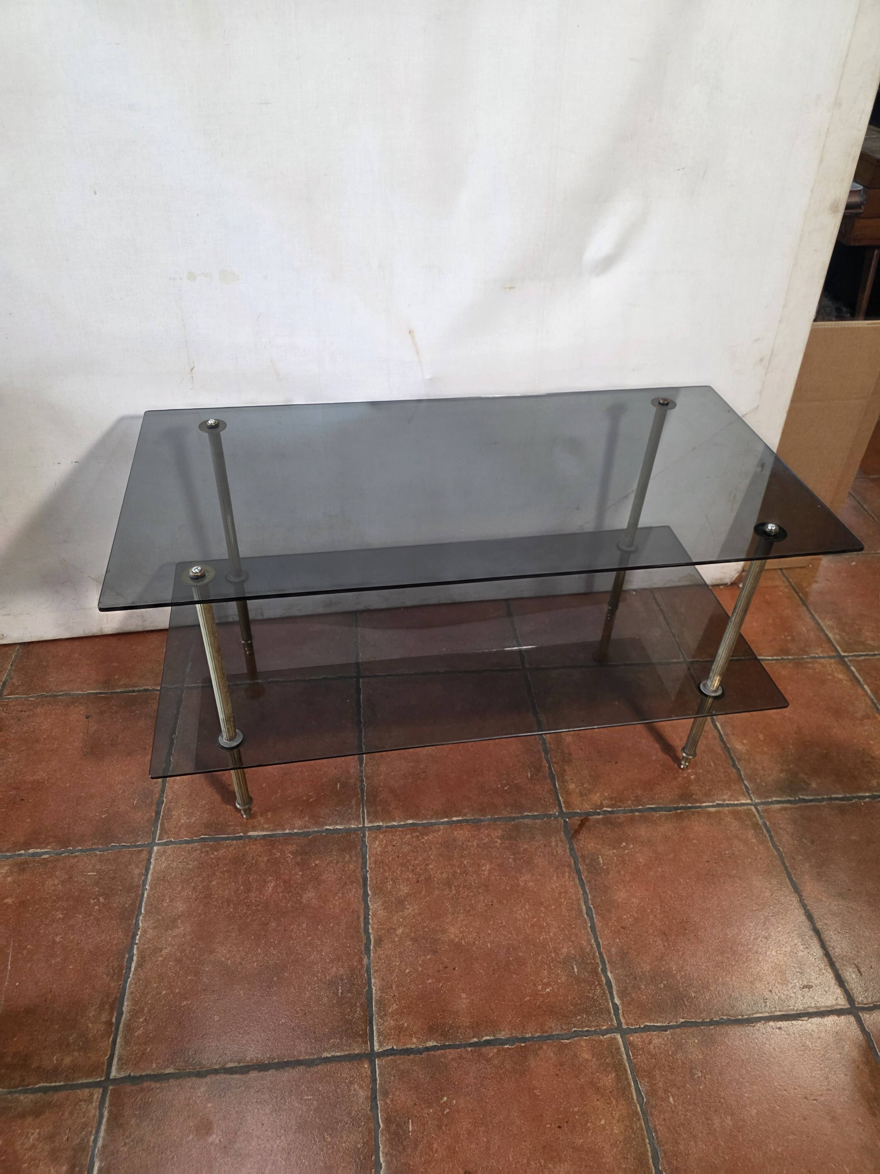 Smoked glass and brass coffee table from the 1970s.