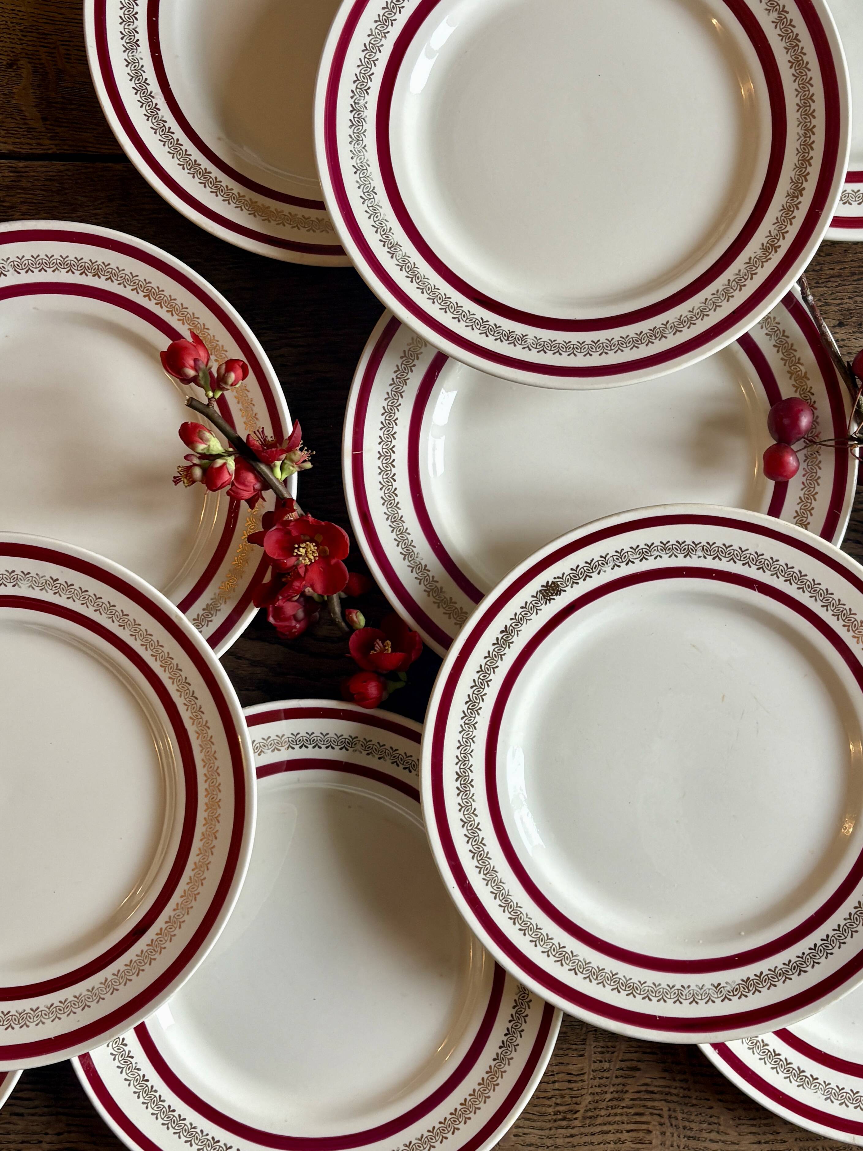 Set of 12 antique Gien red and gold dinner plates.