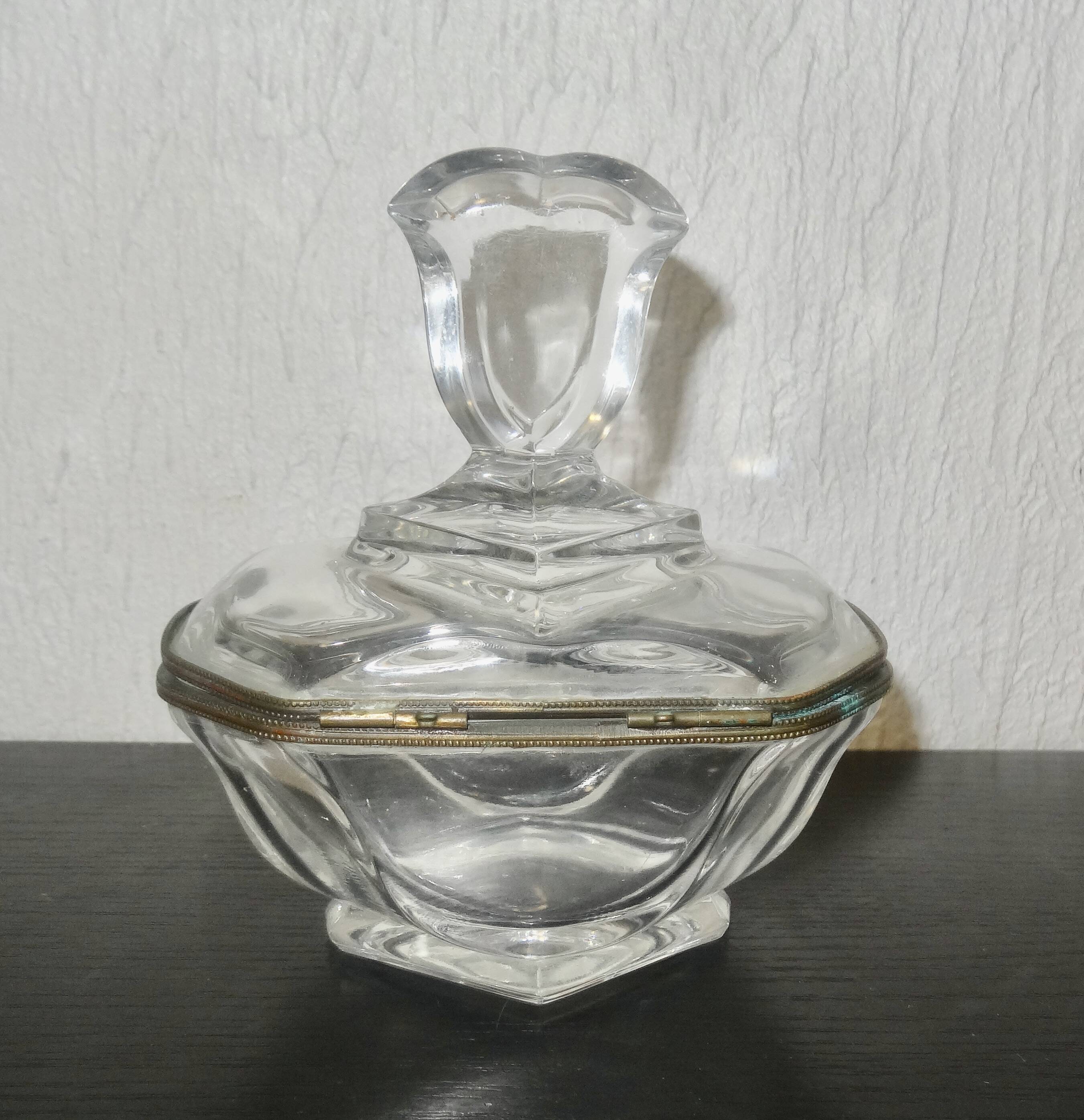 glass jewelry box with brass cherub decoration