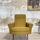 Vintage armchair in fabric and metal compass legs, circa 1950.