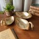 Trio of “swan” cups in gilded brass