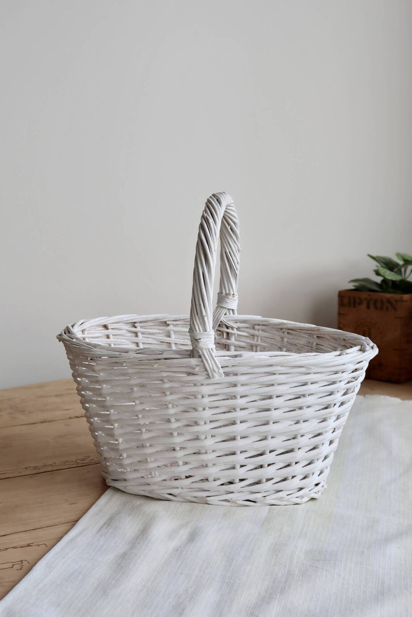 Vintage wicker basket painted white