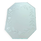 Beveled mirror with floral decor