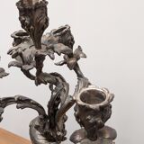 Silver metal candlesticks.