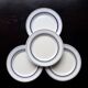 4 vintage bistro style flat plates in blue and white porcelain