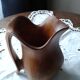 Small wooden pitcher of Olivier