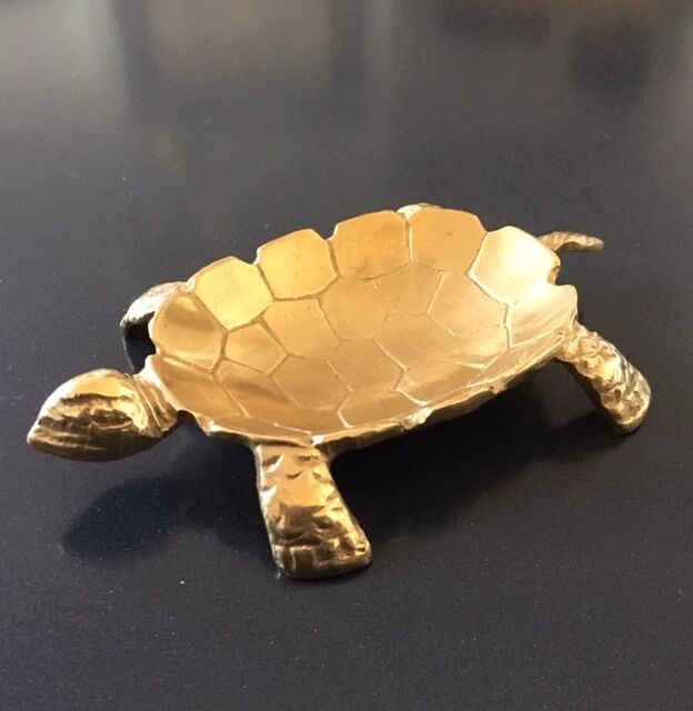 Empty turtle brass pouch