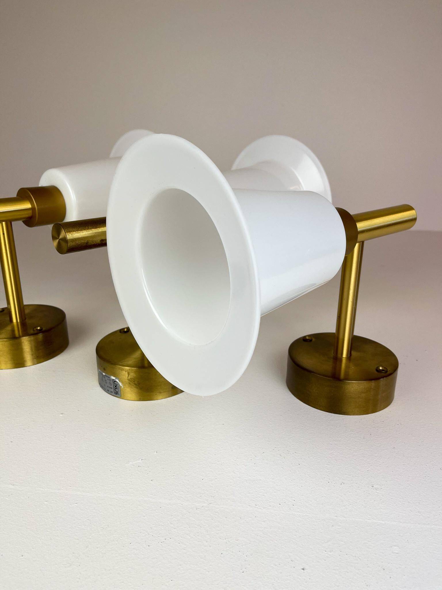 Mid-century brass and acrylic wall lamps Luxus, Sweden, 1960s