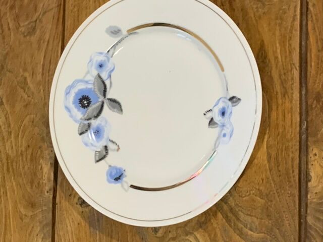 9 white porcelain plates of art deco blue flower limoges