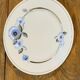 9 white porcelain plates of art deco blue flower limoges