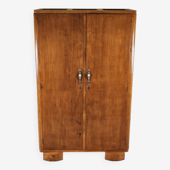 Two-door wardrobe in walnut with brass handles