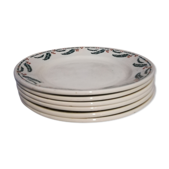 Six flat earthenware plates decorated with holly