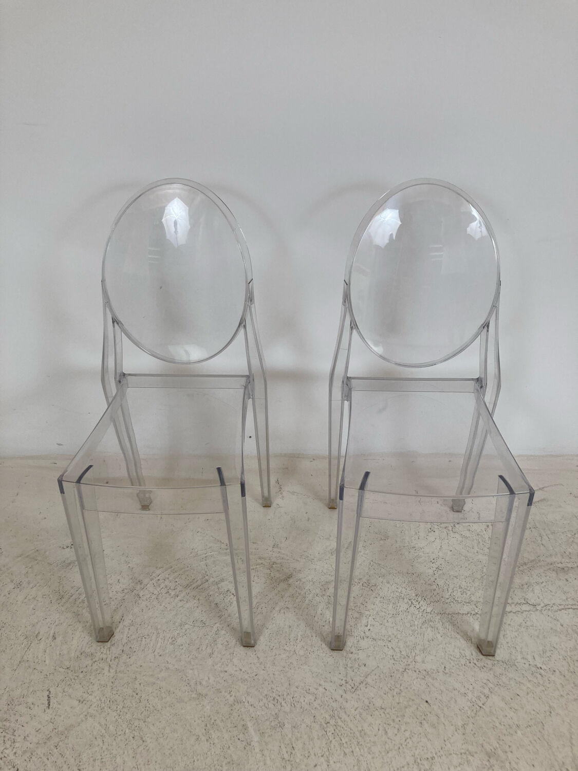 Pair of Victoria Ghost chairs by Philippe Starck Kartell edition