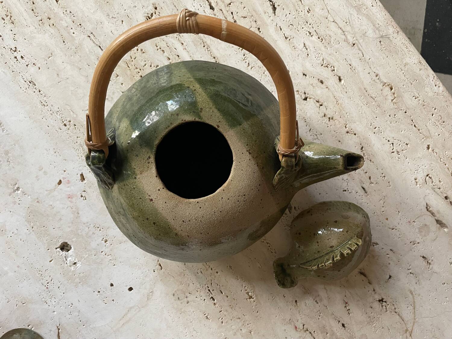 Handmade ceramic teapot with green fish and bamboo