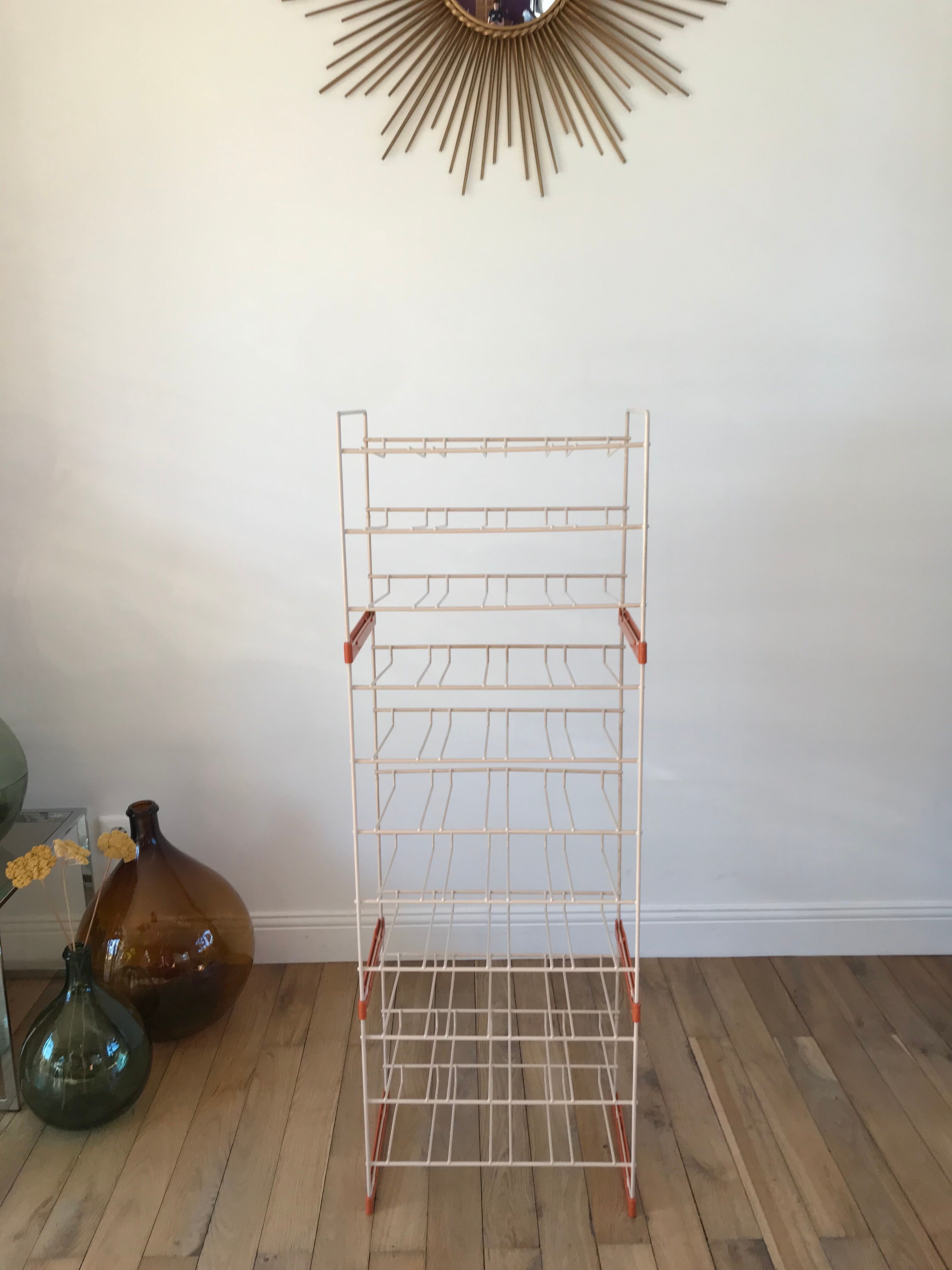 White and orange industrial shelf brand "caddie" 50s
