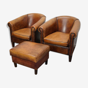 Set of 2 club armchairs with vintage leather footrest Netherlands