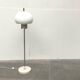 Italian space-style floor lamp from the 1960s with a stone base.