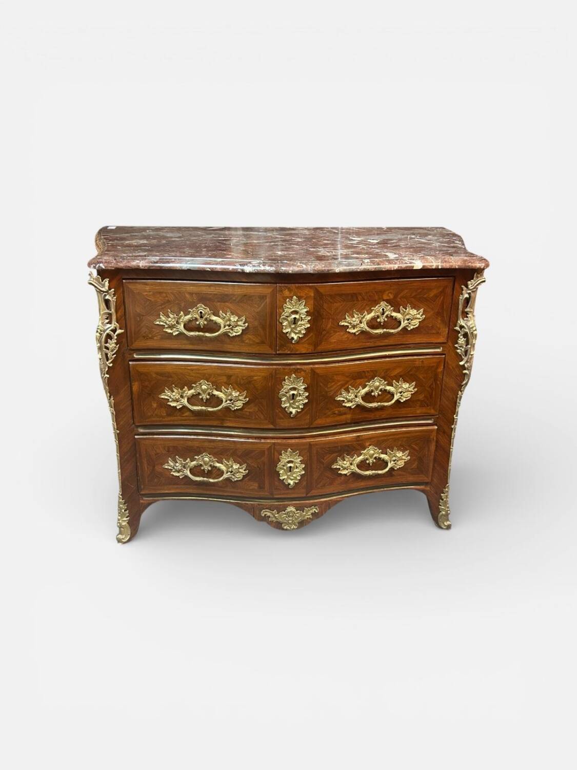 Louis XV period commode with violet wood veneer.