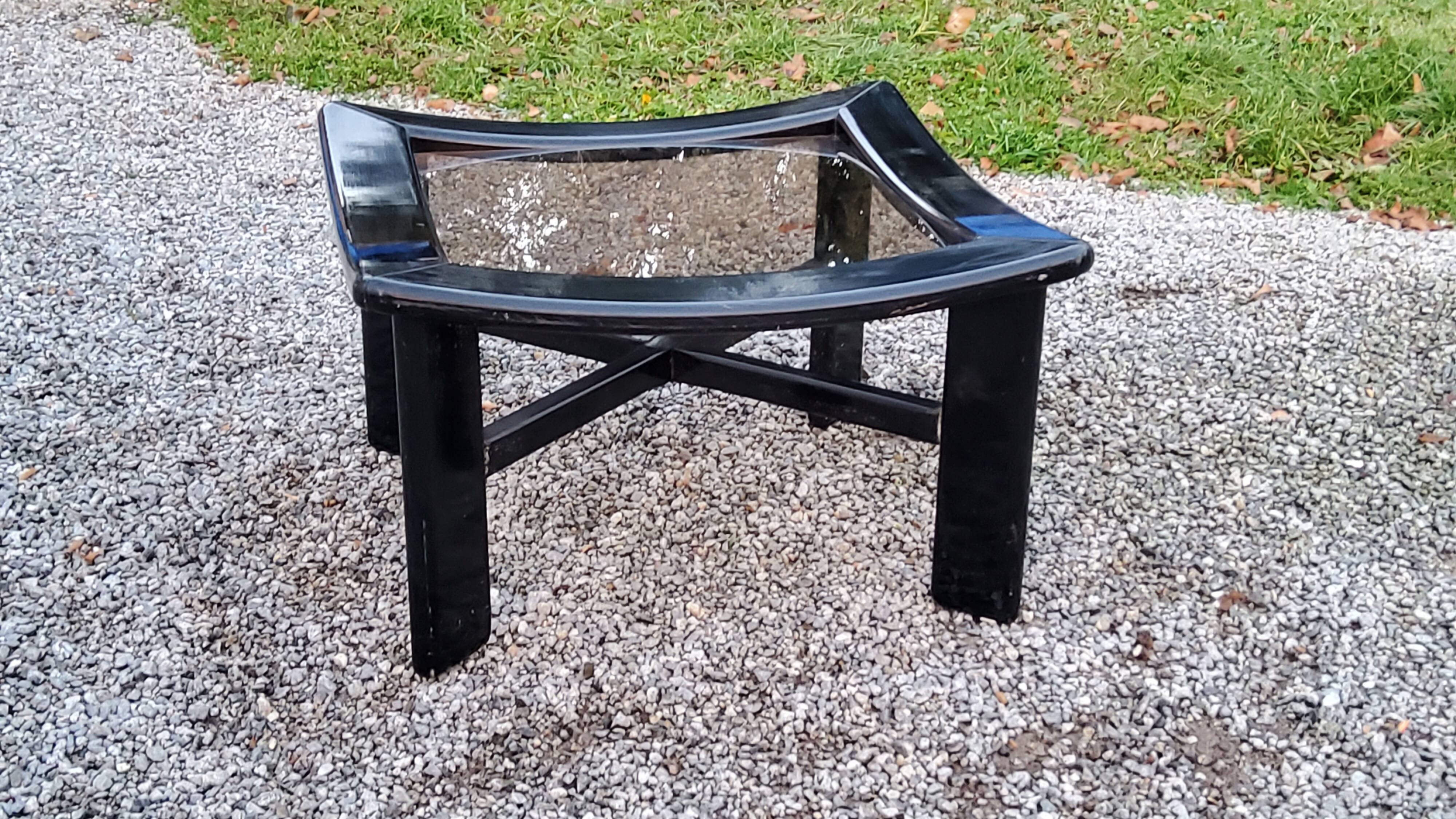 70s design coffee table in black lacquered wood with smoked glass top