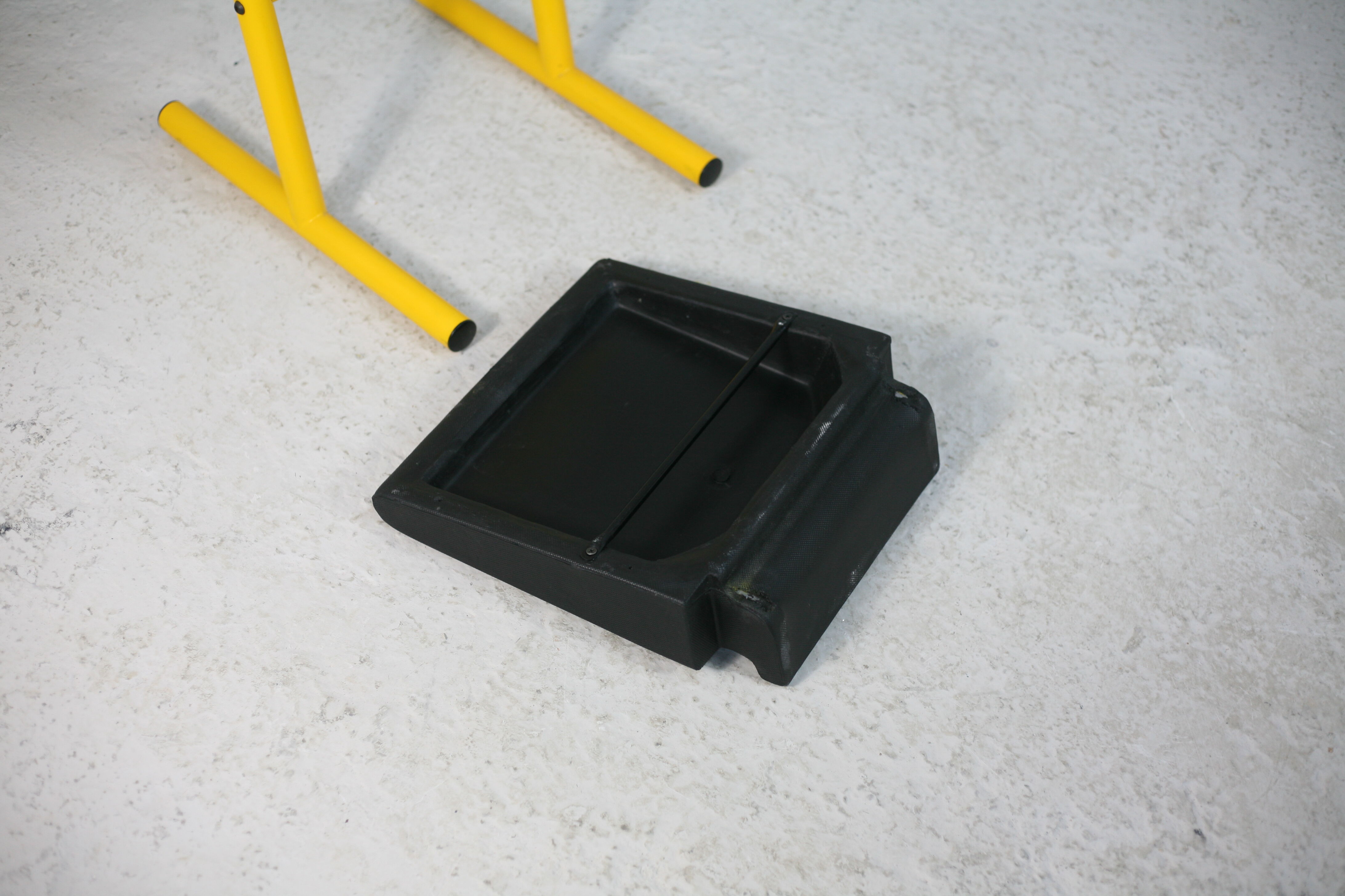 Adjustable seat chair. Circa 1980. Italy. Yellow lacquered steel.