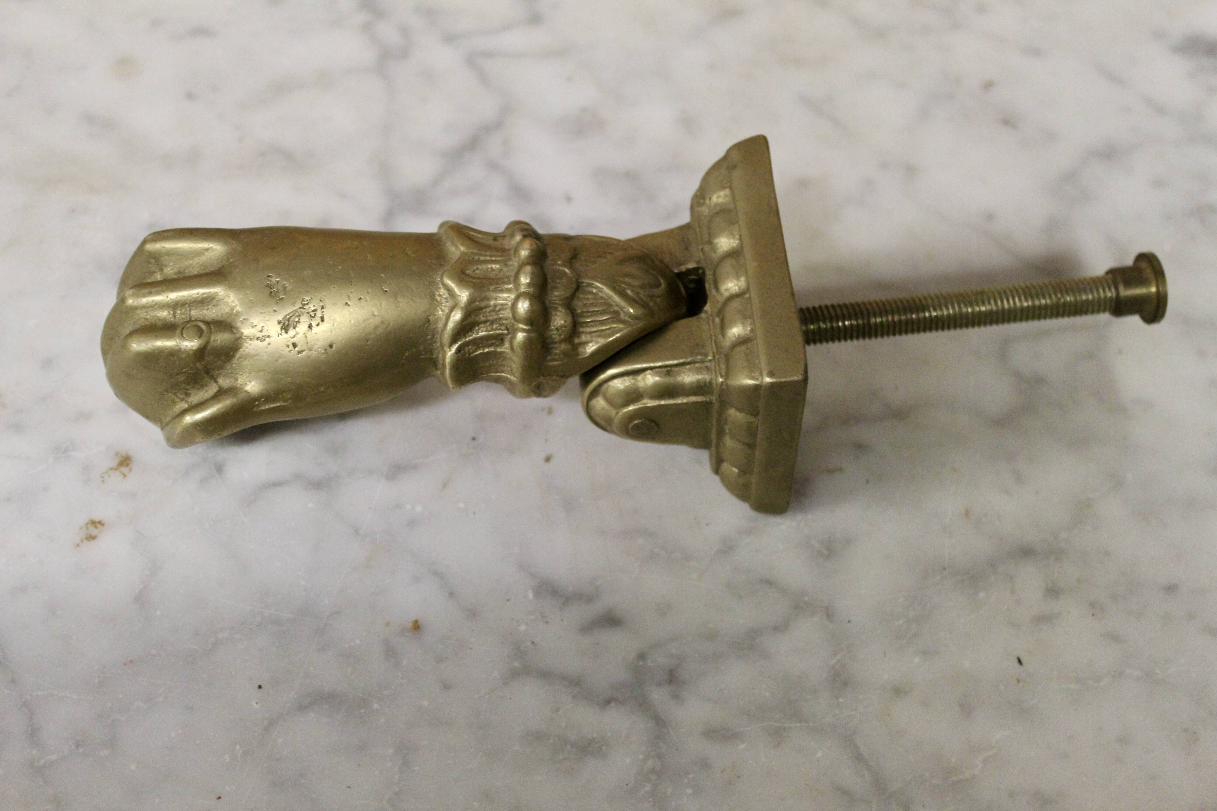 Solid bronze door knocker, hand shape, 19th century