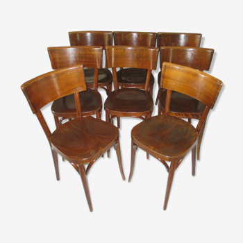 Suite de 8 chaises bistrot Baumann des années 70