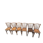 Six old wooden bistro chairs